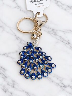 Stunning blue peacock bag charm/keyring with crystal accents gold hardware